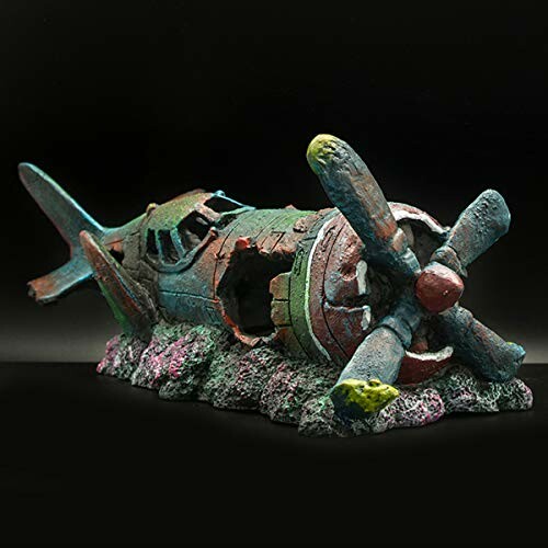 Decorative aquarium ornament of a sunken airplane wreck.