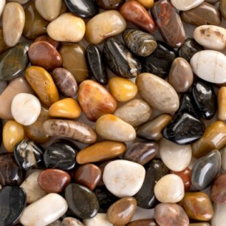 A collection of colorful polished stones in various shapes and sizes.